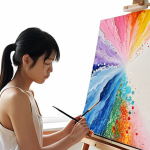 A deeply serene portrayal of a young Japanese woman finding profound relief from digital fatigue. She is immersed in an art therapy session, focusing intently on painting with vivid, flowing watercolors onto a large canvas, or perhaps gently molding soft clay. The setting is minimalist and calming, with natural light filtering in. The artwork she creates abstractly represents the release of stress and the emergence of inner peace, subtly showing the transformation from a state of overwhelm to quiet introspection. Emphasize the tactile, sensory connection to the art materials, highlighting the contrast with screen-based activities. High detail, soft focus, an atmosphere of healing and self-discovery.
